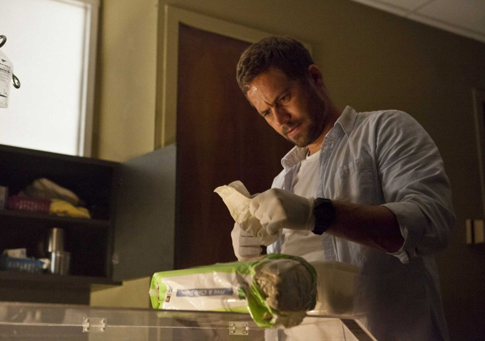 Paul Walker learns how to change a diaper.